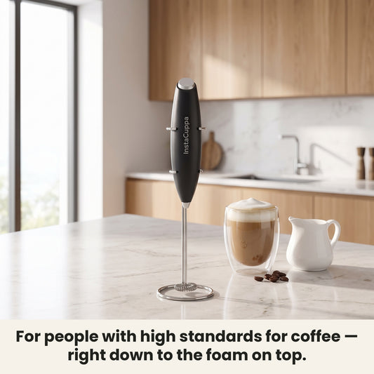 InstaCuppa Milk Frother with Stand - Black - frother hanging on its stand in the kitchen, ready for coffee · 4 whisks