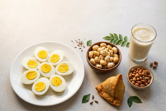 Boiled eggs with makhana, samosa, peanuts and a sattu drink — calories in common Indian snacks