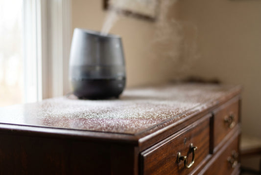 White mineral dust on furniture near ultrasonic humidifier