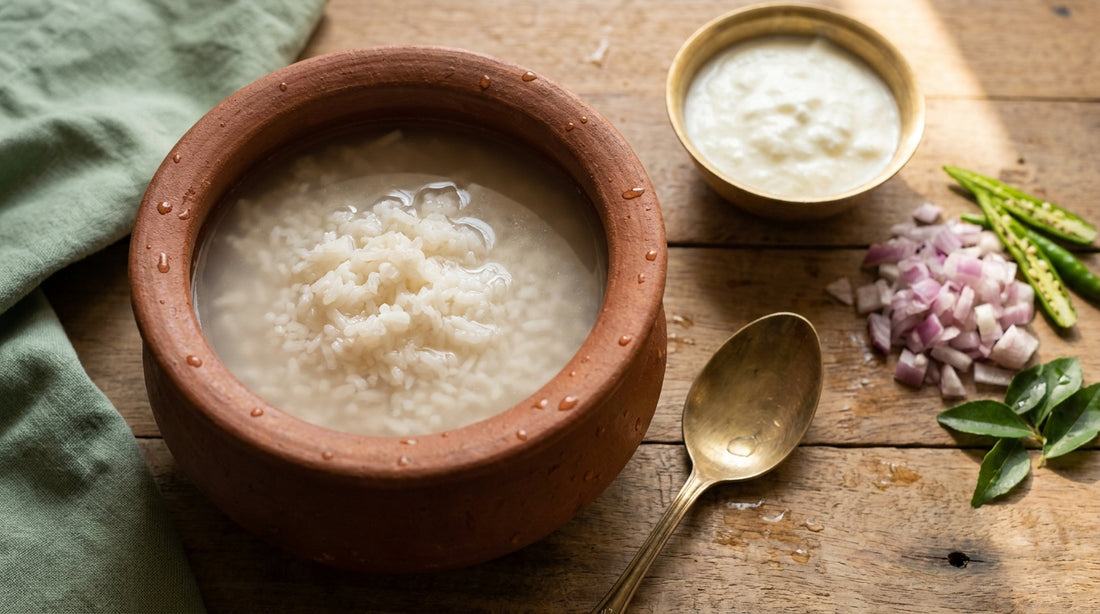 Fermented rice water (neeraagaaram / pazhaya sadam) in a clay pot with curd, onion, chilli and curry leaves