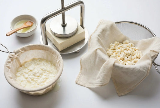 Three paneer making tools strainer press and muslin cloth compared