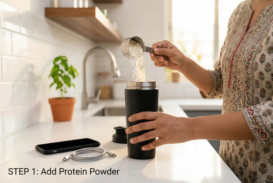 How to use electric protein shaker - woman adding protein powder to shaker in kitchen