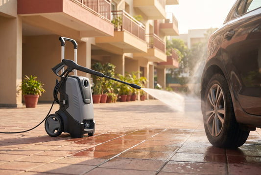 Electric high-pressure washer cleaning a car and tiled driveway outside an Indian home — best pressure washer in India 2026