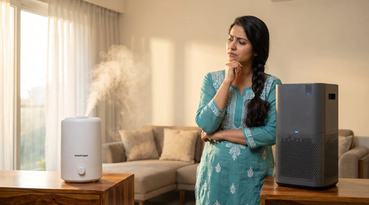Humidifier and air purifier side by side in an Indian living room with woman deciding which one to buy