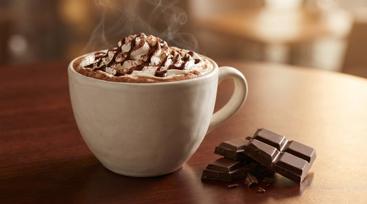 Classic hot cafe mocha with whipped cream and chocolate drizzle
