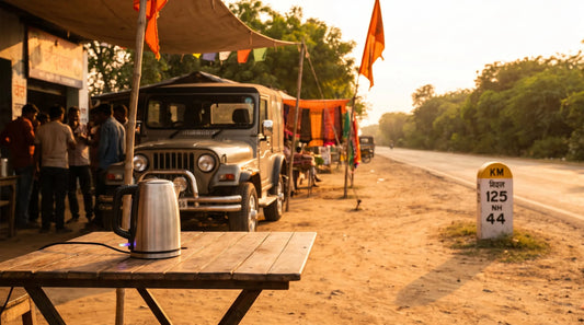 Portable kettle at an Indian highway rest stop with car and road trip setting