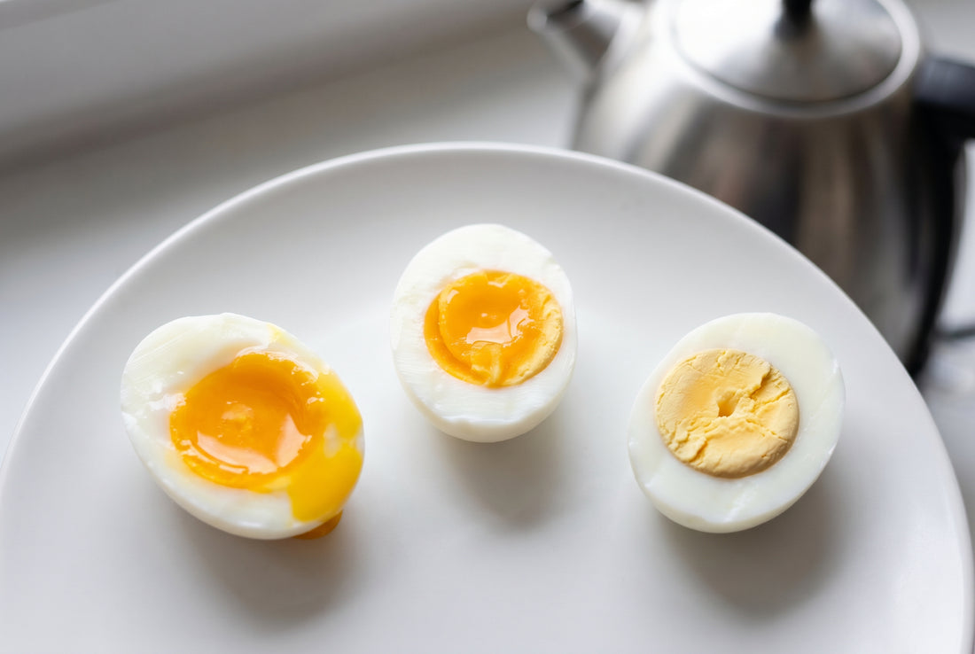 Boiled eggs cut open showing soft medium hard yolk - electric kettle timing guide