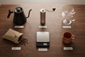 Complete home pour over coffee station with gooseneck kettle grinder dripper scale and beans