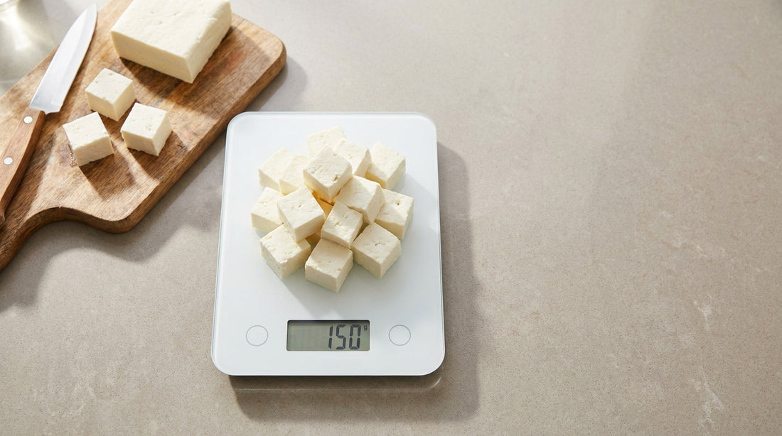 InstaCuppa paneer protein guide - 150 g of paneer cubes on a digital kitchen scale
