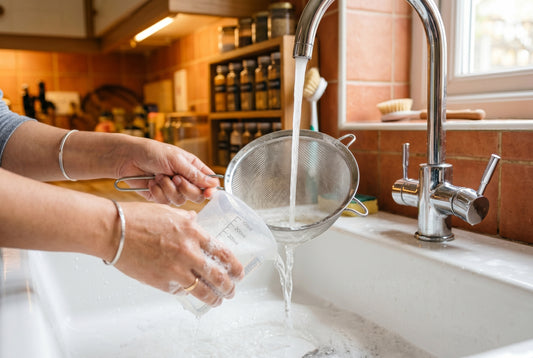 Rice dispenser being cleaned and maintained