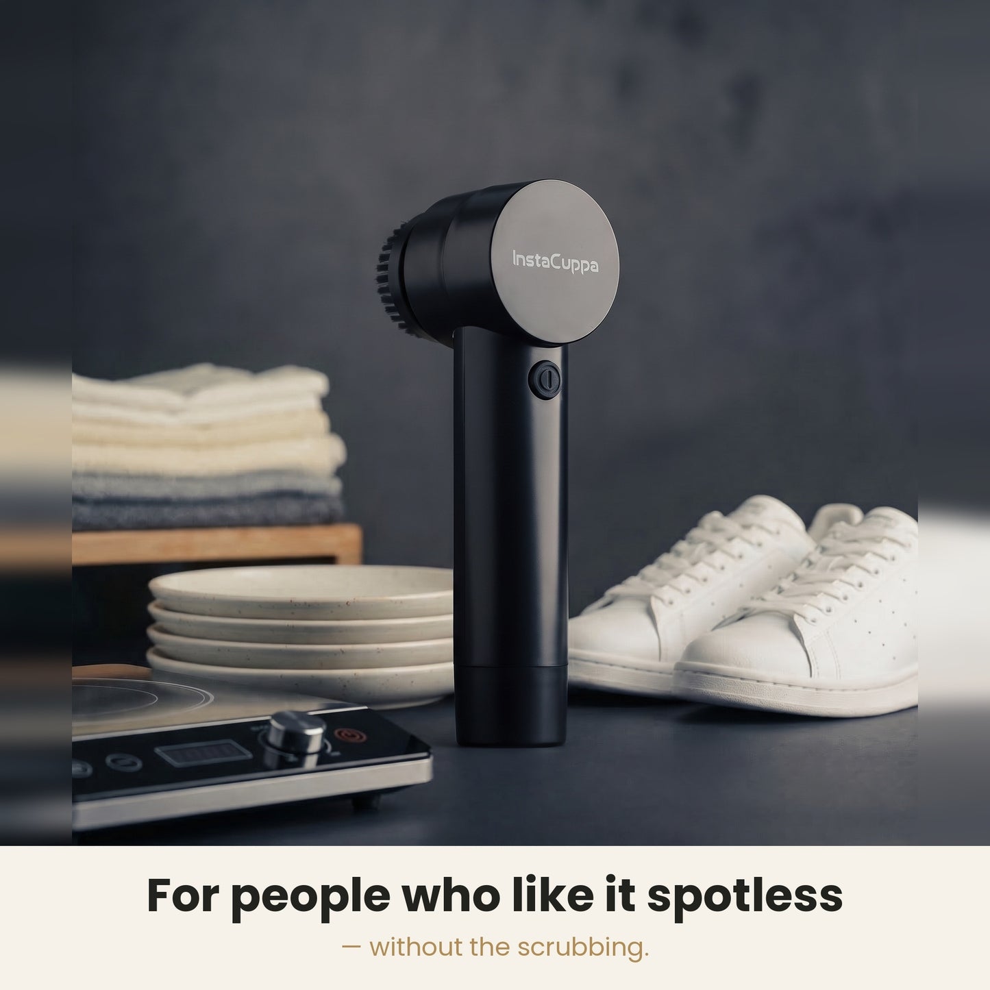 InstaCuppa Electric Cleaning Brush - spinning brush head cleaning a kitchen sink corner