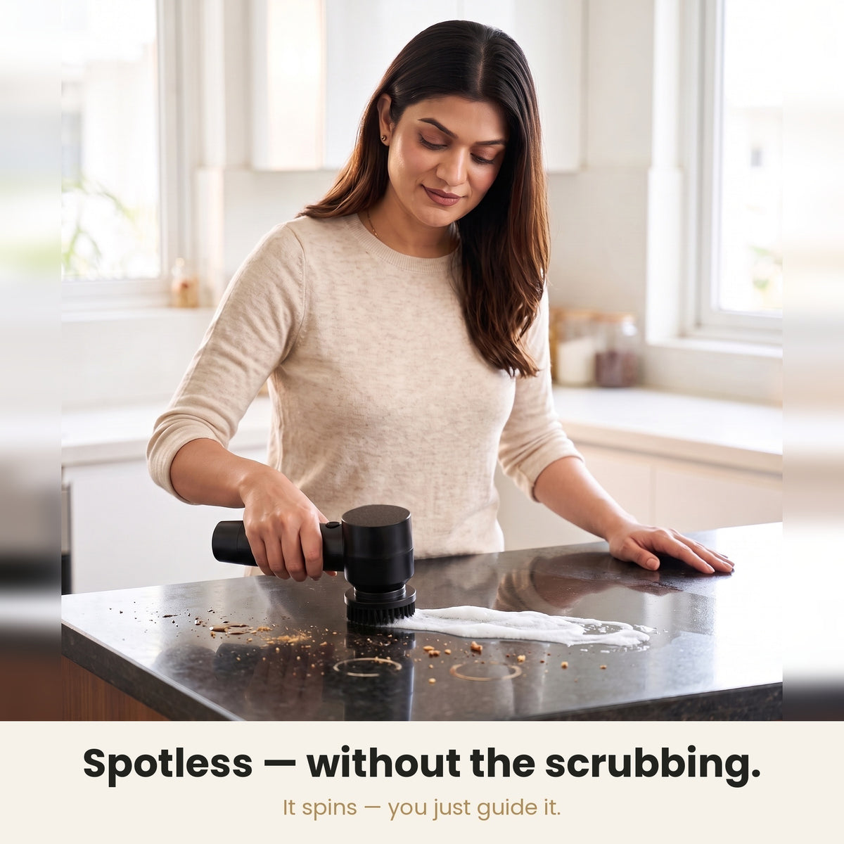 InstaCuppa Electric Cleaning Brush - bristles and suds cleaning around the base of a chrome tap