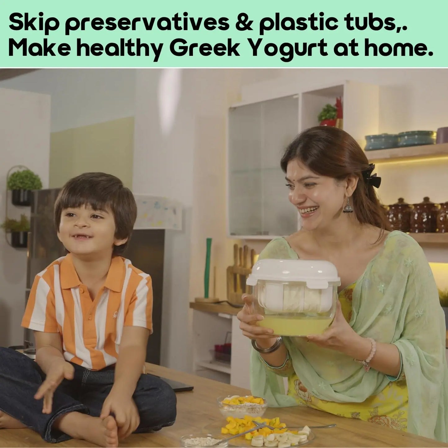 InstaCuppa Greek yogurt maker 2.5 litre for families - mom showing healthy homemade yogurt to excited child