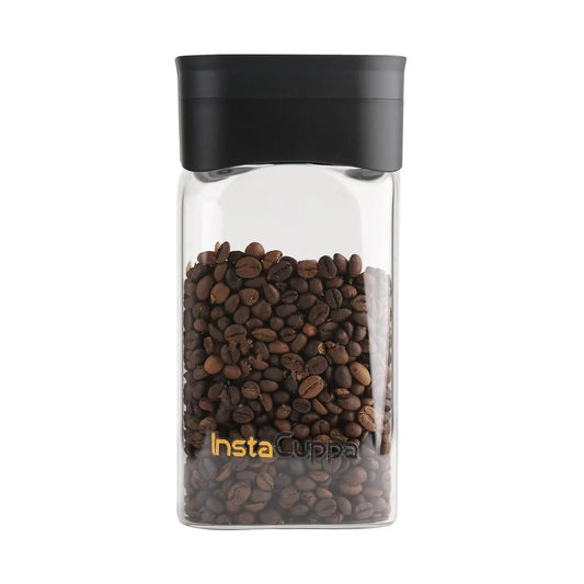 InstaCuppa airtight glass jar with vacuum lid filled with coffee beans - clear borosilicate glass with black lid