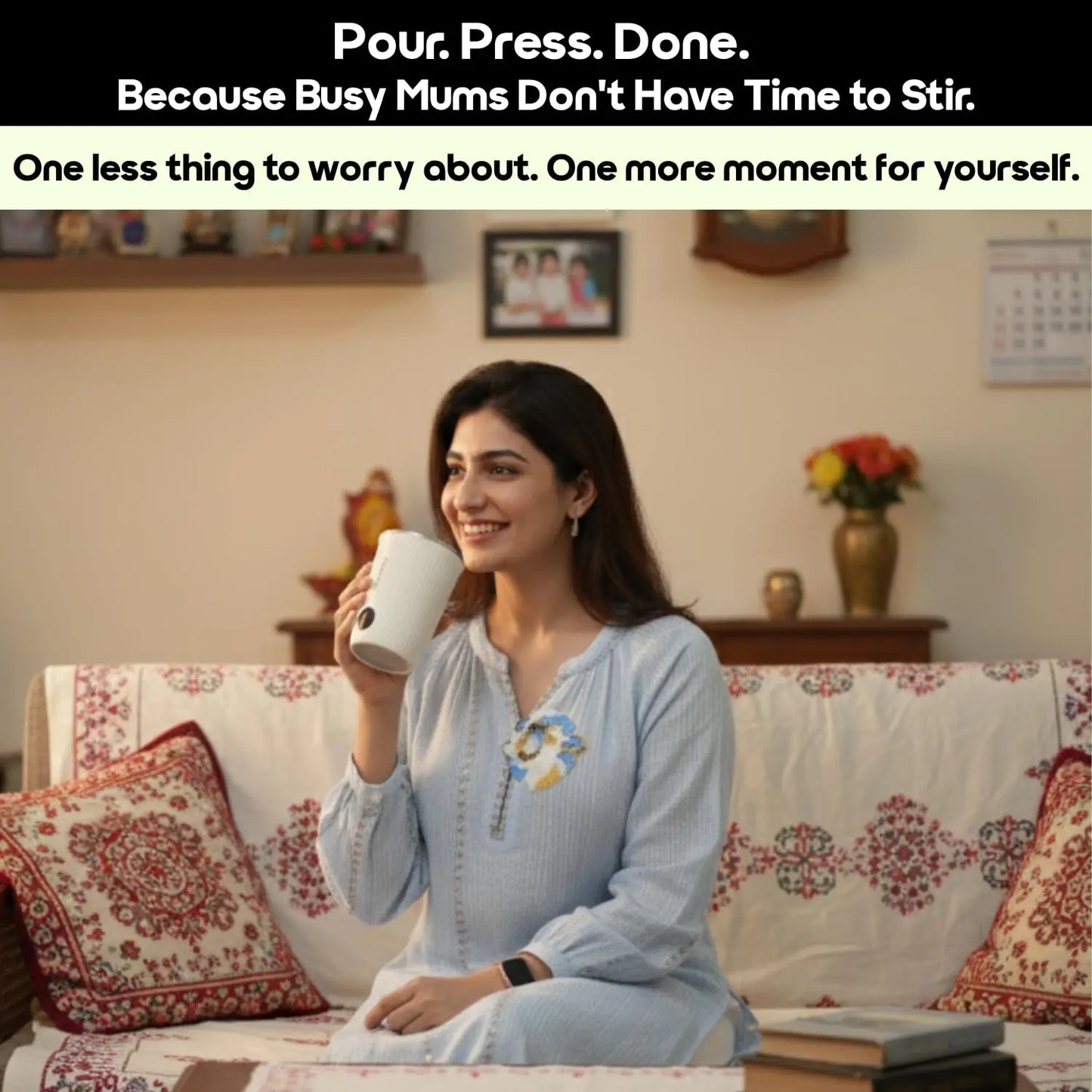 InstaCuppa Rechargeable Self Stirring Mug used by Indian mom enjoying coffee on sofa in living room