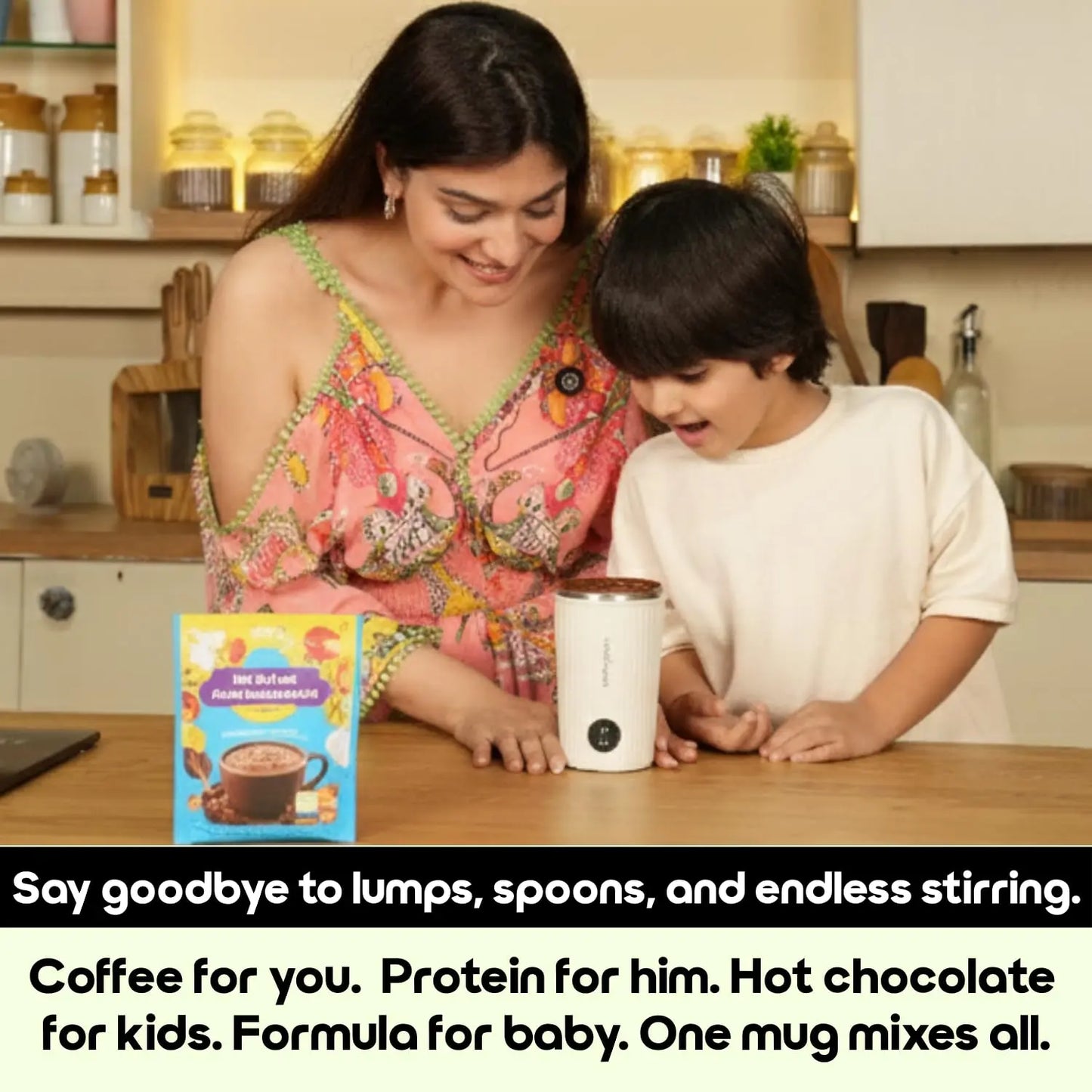 InstaCuppa Rechargeable Self Stirring Mug used by Indian mom making hot chocolate with child in kitchen