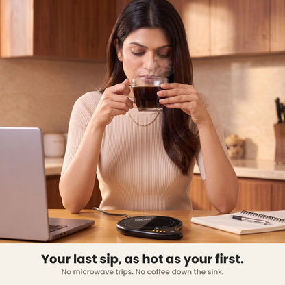 InstaCuppa coffee mug warmer for desk keeping her last sip as hot as her first