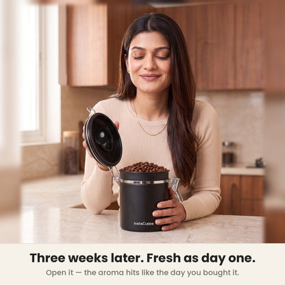 InstaCuppa Airtight Coffee Container 500g - Black - lid lifted showing coffee powder still aromatic inside
