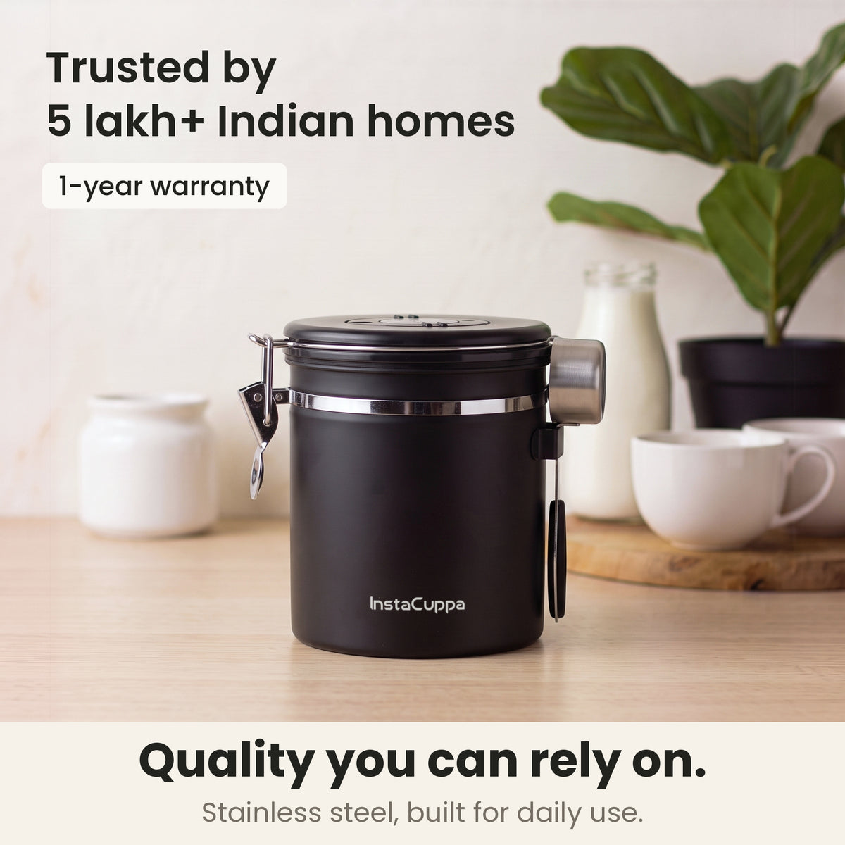 Airtight coffee container - Black - stainless steel coffee canister on a kitchen counter, trusted by 5 lakh+ Indian homes