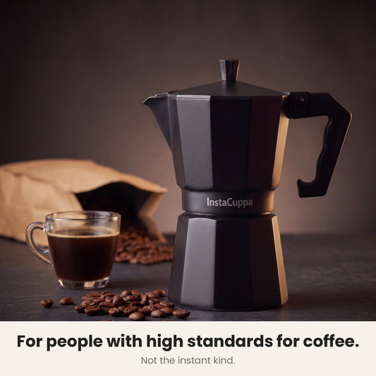 InstaCuppa Aluminium Moka Pot 300 ml - Black - for people with high standards for coffee, not the instant kind: the moka pot beside a glass cup of coffee and coffee beans #color-black