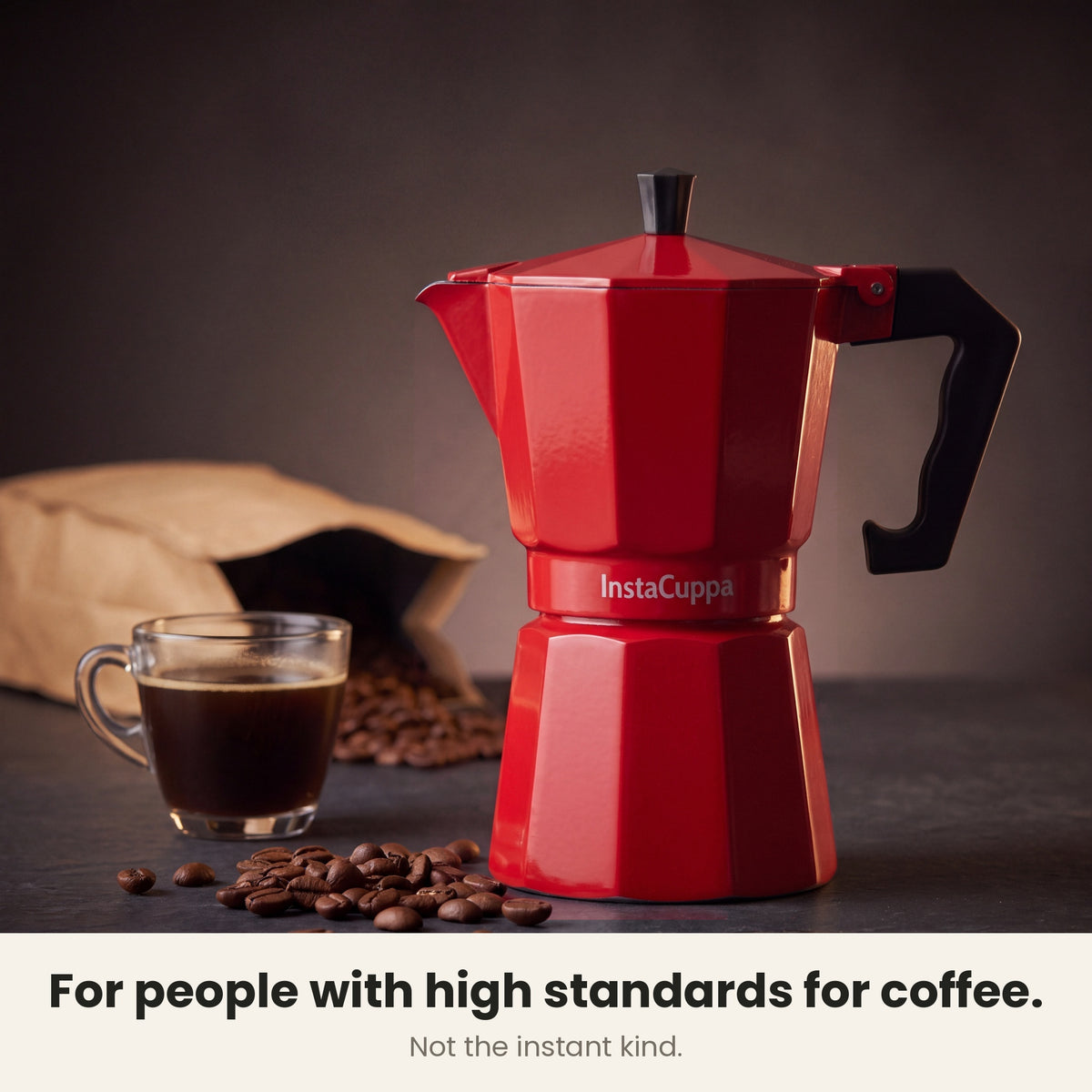InstaCuppa Aluminium Moka Pot 300 ml - Red - for people with high standards for coffee, not the instant kind: the moka pot beside a glass cup of coffee and coffee beans