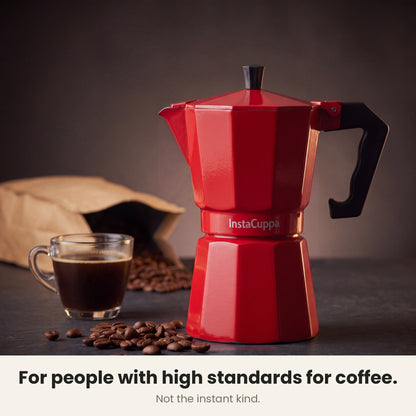 InstaCuppa Aluminium Moka Pot 300 ml - Red - for people with high standards for coffee, not the instant kind: the moka pot beside a glass cup of coffee and coffee beans