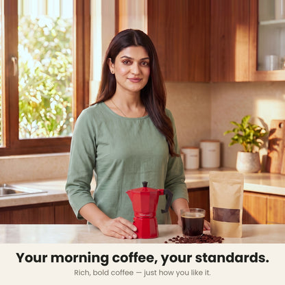 InstaCuppa Aluminium Moka Pot 300 ml - Red - your morning coffee, your standards: a woman in her kitchen with the moka pot and a glass of rich, bold coffee