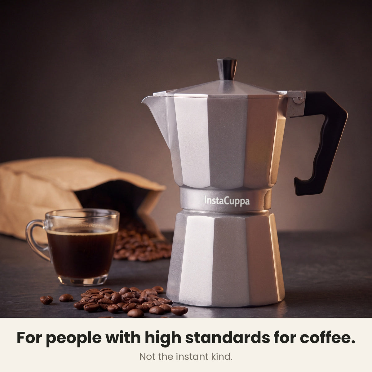 InstaCuppa Aluminium Moka Pot 300 ml - Silver - for people with high standards for coffee, not the instant kind: the moka pot beside a glass cup of coffee and coffee beans