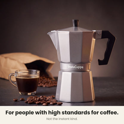 InstaCuppa Aluminium Moka Pot 300 ml - Silver - for people with high standards for coffee, not the instant kind: the moka pot beside a glass cup of coffee and coffee beans