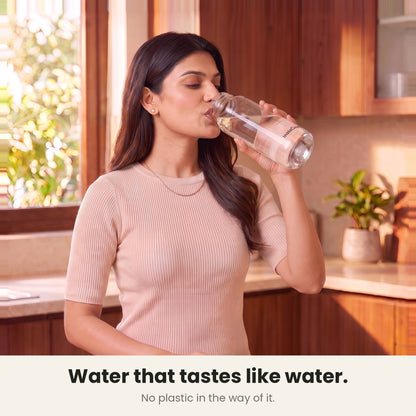 InstaCuppa Borosilicate Glass Water Bottle 1 Litre - Black - drinking water from the bottle