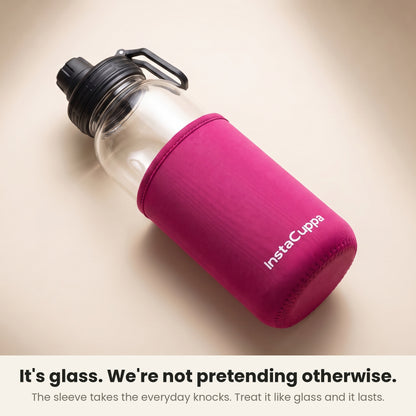 InstaCuppa Borosilicate Glass Water Bottle 1 Litre - Pink - neoprene sleeve slid down to show the glass