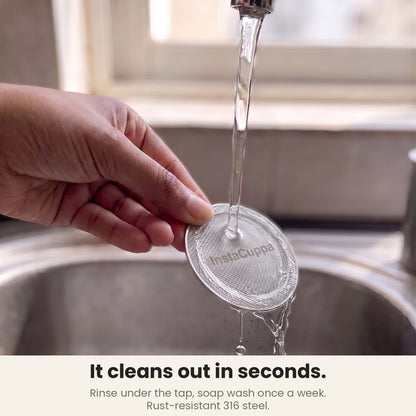 InstaCuppa Espresso Puck Screen - rinsing the reusable steel mesh filter under a tap