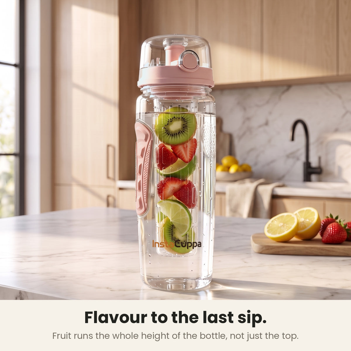 InstaCuppa Fruit Infuser Water Bottle 1 Litre - Rose - kiwi, strawberry and lime along the full rod on a kitchen counter