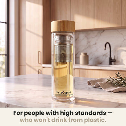InstaCuppa Glass Tea Infuser Bottle 450 ML - brewed tea on a marble kitchen counter