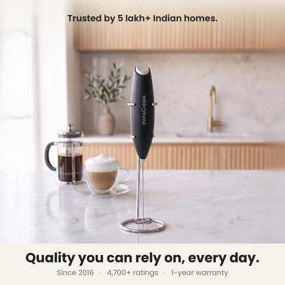 InstaCuppa Milk Frother with Stand - Black - kitchen scene with a French press and cappuccino, trusted by coffee lovers · 4 whisks