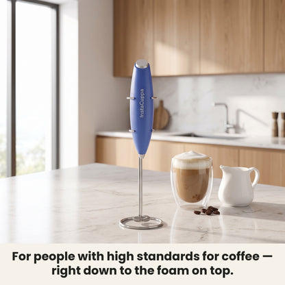 InstaCuppa Milk Frother with Stand - Blue - frother hanging on its stand in the kitchen, ready for coffee · 4 whisks