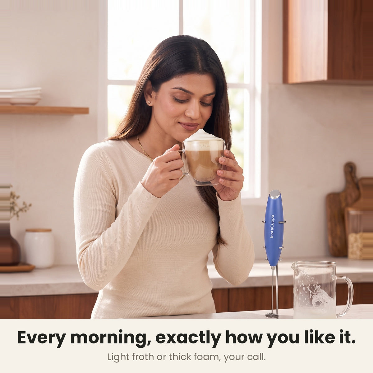 InstaCuppa Milk Frother with Stand - Blue - woman enjoying a cafe-style cappuccino · 4 whisks