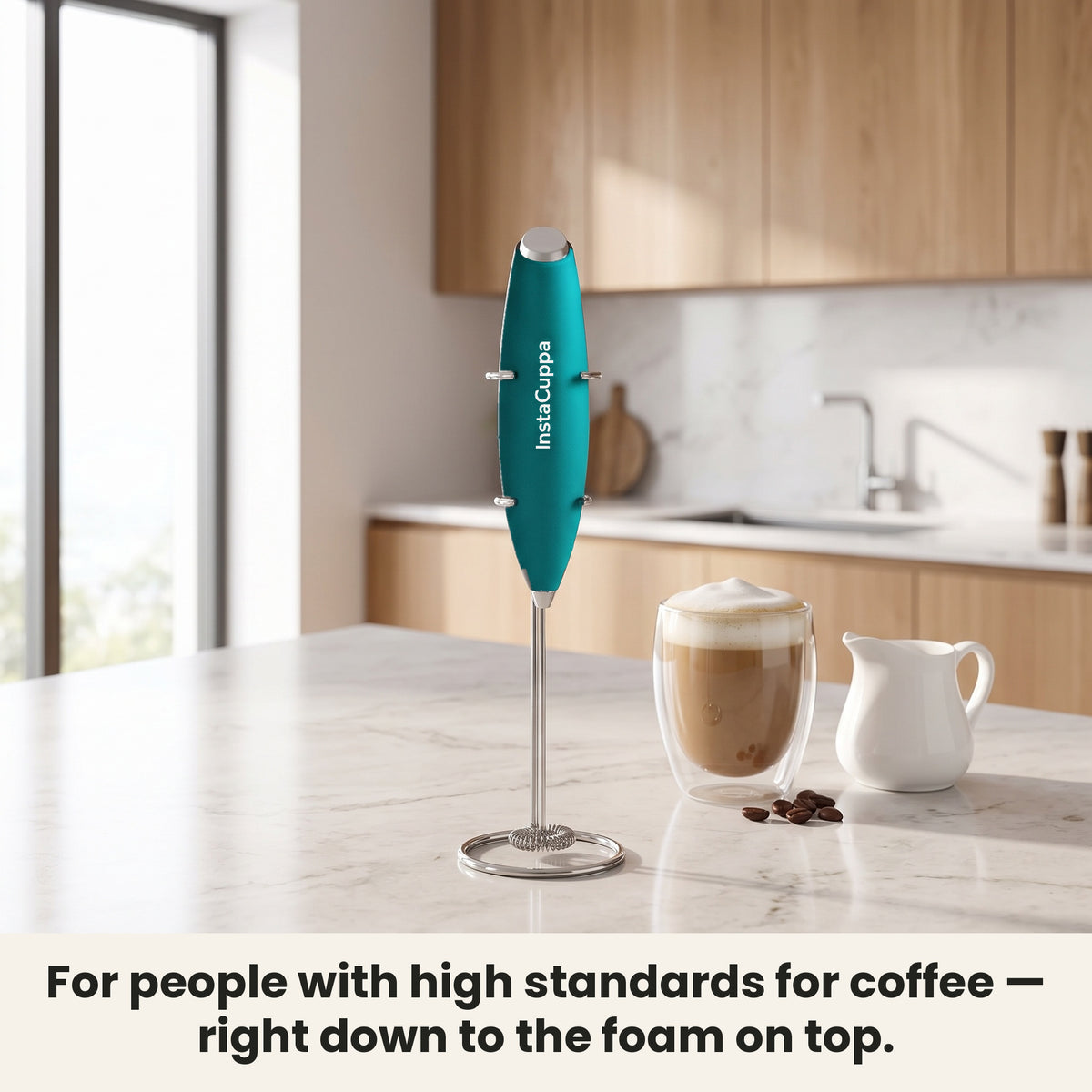 InstaCuppa Milk Frother with Stand - Green - frother hanging on its stand in the kitchen, ready for coffee · 4 whisks