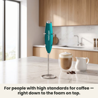InstaCuppa Milk Frother with Stand - Green - frother hanging on its stand in the kitchen, ready for coffee · 4 whisks