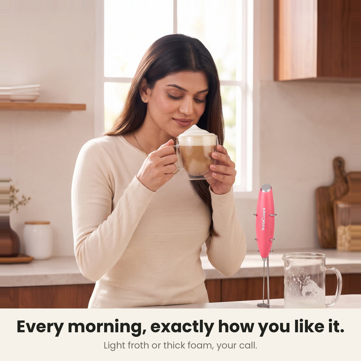 InstaCuppa Milk Frother with Stand - Pink - woman enjoying a cafe-style cappuccino · 4 whisks
