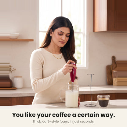 InstaCuppa Milk Frother with Stand - Red - woman frothing milk for her coffee at home · 4 whisks