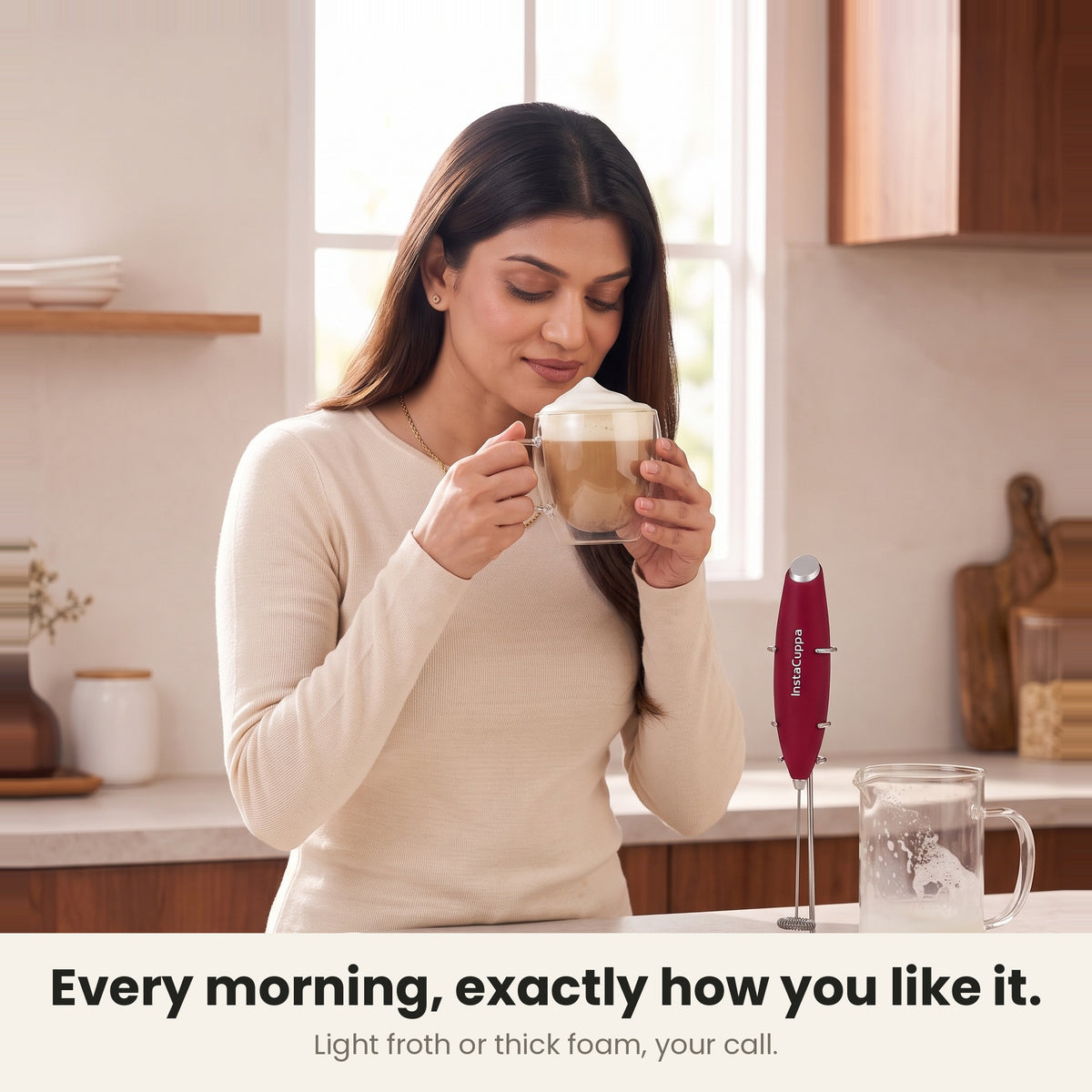 InstaCuppa Milk Frother with Stand - Red - woman enjoying a cafe-style cappuccino · 4 whisks