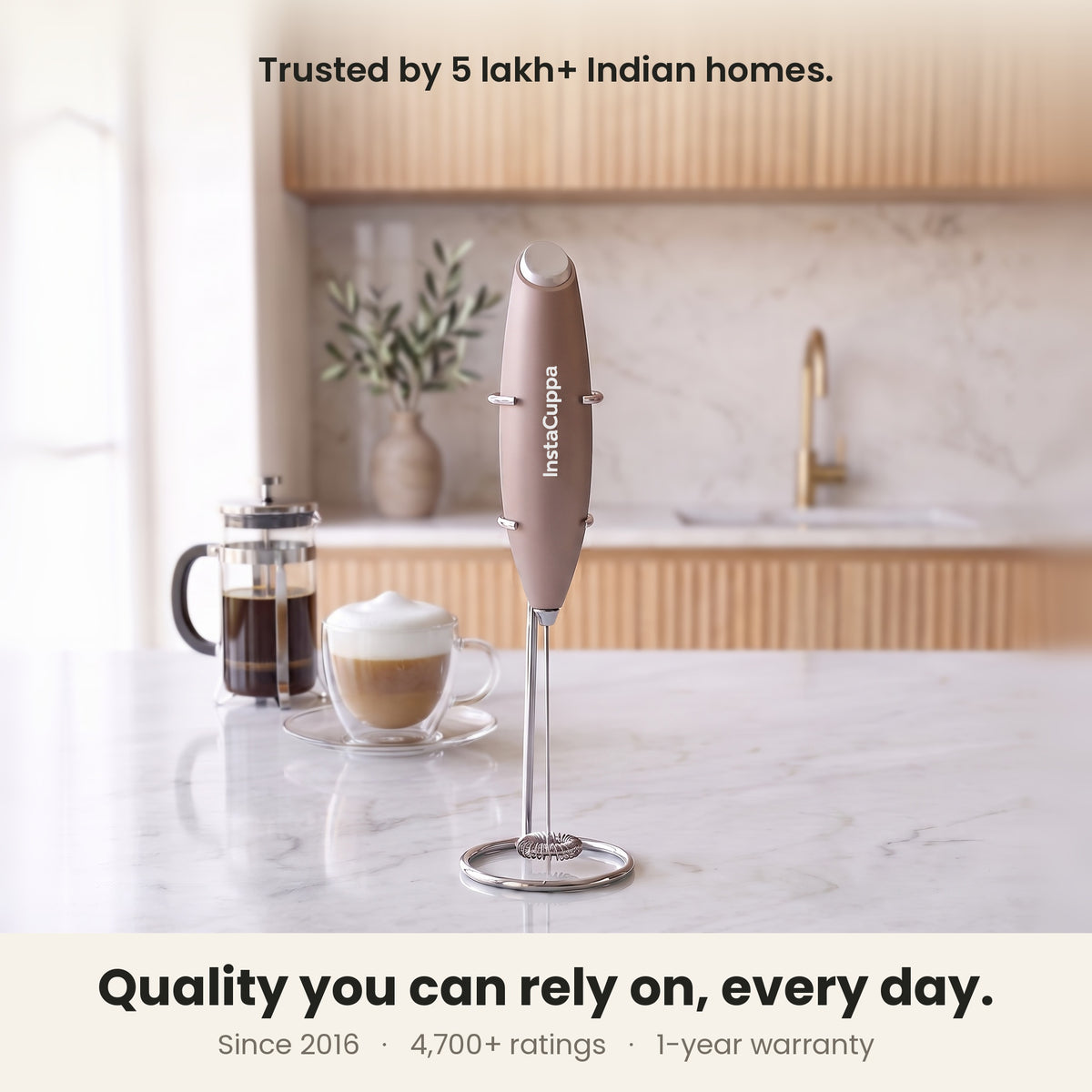 InstaCuppa Milk Frother with Stand - Rose Gold - kitchen scene with a French press and cappuccino, trusted by coffee lovers · 4 whisks