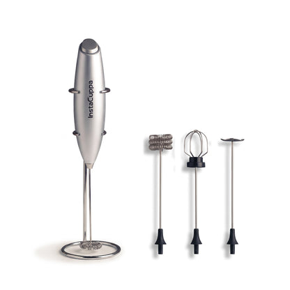 InstaCuppa Milk Frother with Stand - Silver - hero shot of the handheld frother with its stand and 4 whisk attachments · 4 whisks