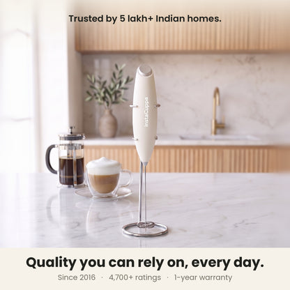 InstaCuppa Milk Frother with Stand - White - kitchen scene with a French press and cappuccino, trusted by coffee lovers · 4 whisks