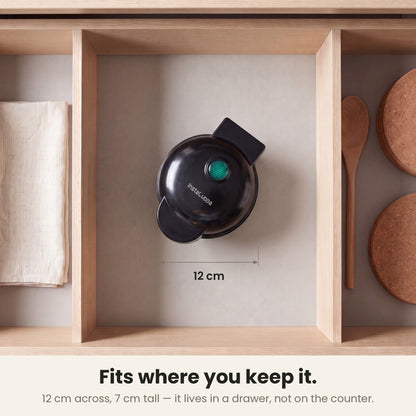 InstaCuppa Mini Waffle Maker 4 inch - Black - fits where you keep it: 12 cm across and 7 cm tall, stored in a kitchen drawer