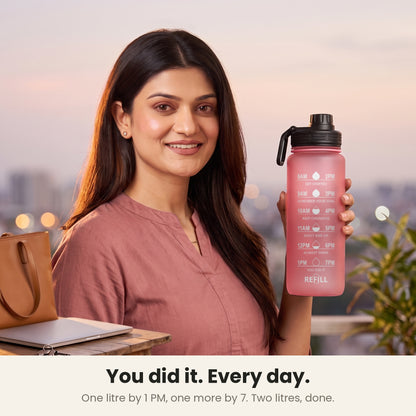 InstaCuppa Motivational Water Bottle 1 Litre - Pink - woman at 7 PM with the bottle: 1 litre by 1 PM, 1 more by 7 PM