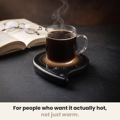InstaCuppa coffee mug warmer for desk keeping a glass mug of coffee hot on dark stone