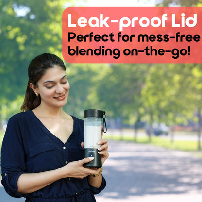 InstaCuppa Portable Blender Classic Edition held by woman in a park - leak-proof lid for mess-free blending on the go