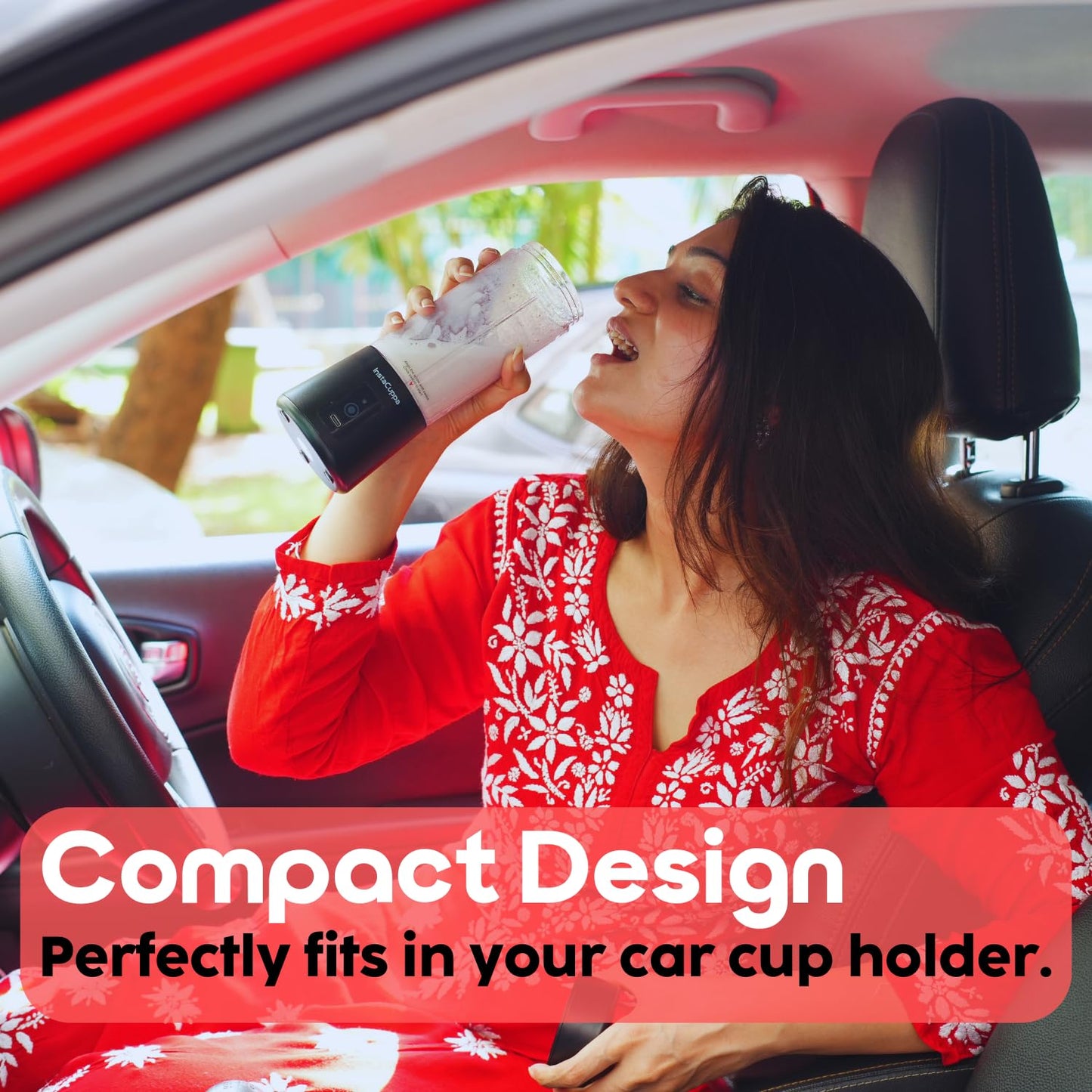 InstaCuppa Portable Blender Classic Edition used by woman in a car - compact design fits a standard car cup holder